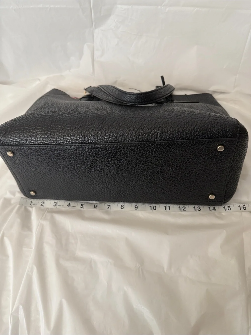 Kate Spade Tyler Carter large blackleather tote ,pink interior, tiny flaw